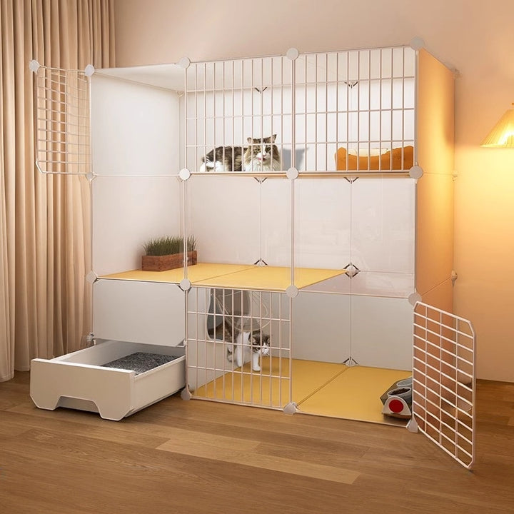 a white indoor catio with 2 cats is placed in living room